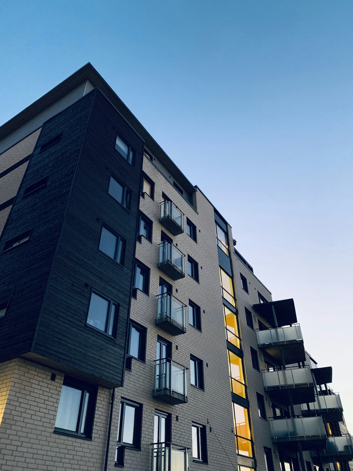 Modern apartment complex — bringing utility billing in-house gives operators full control over billing across properties like this